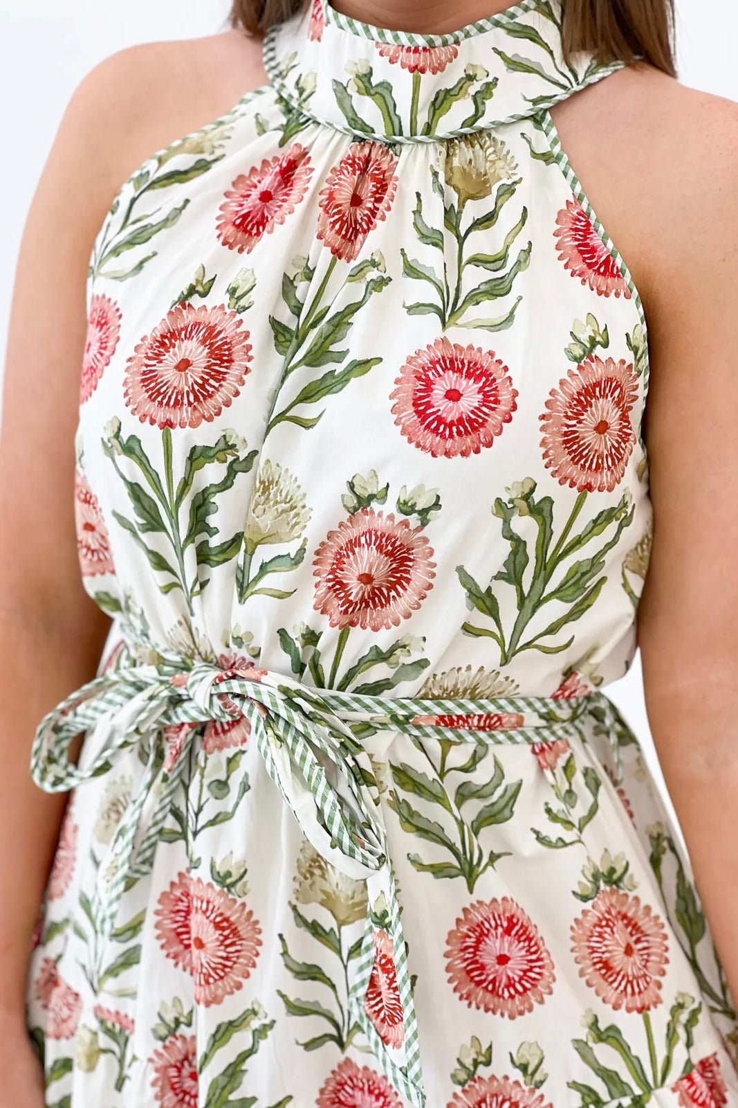 Halter tie neckline on a relaxed floral midi dress