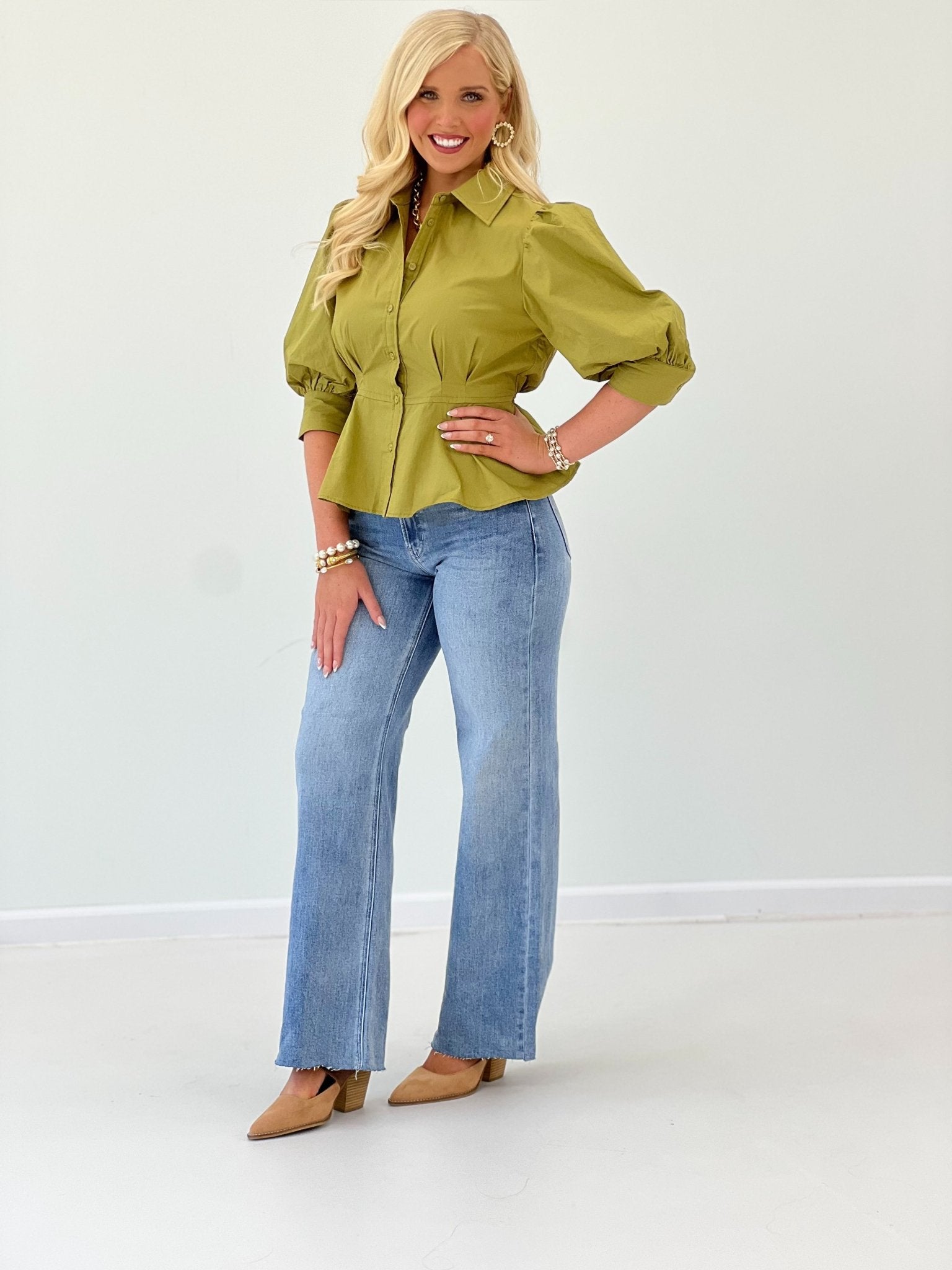 Peplum top in willow with a full button front