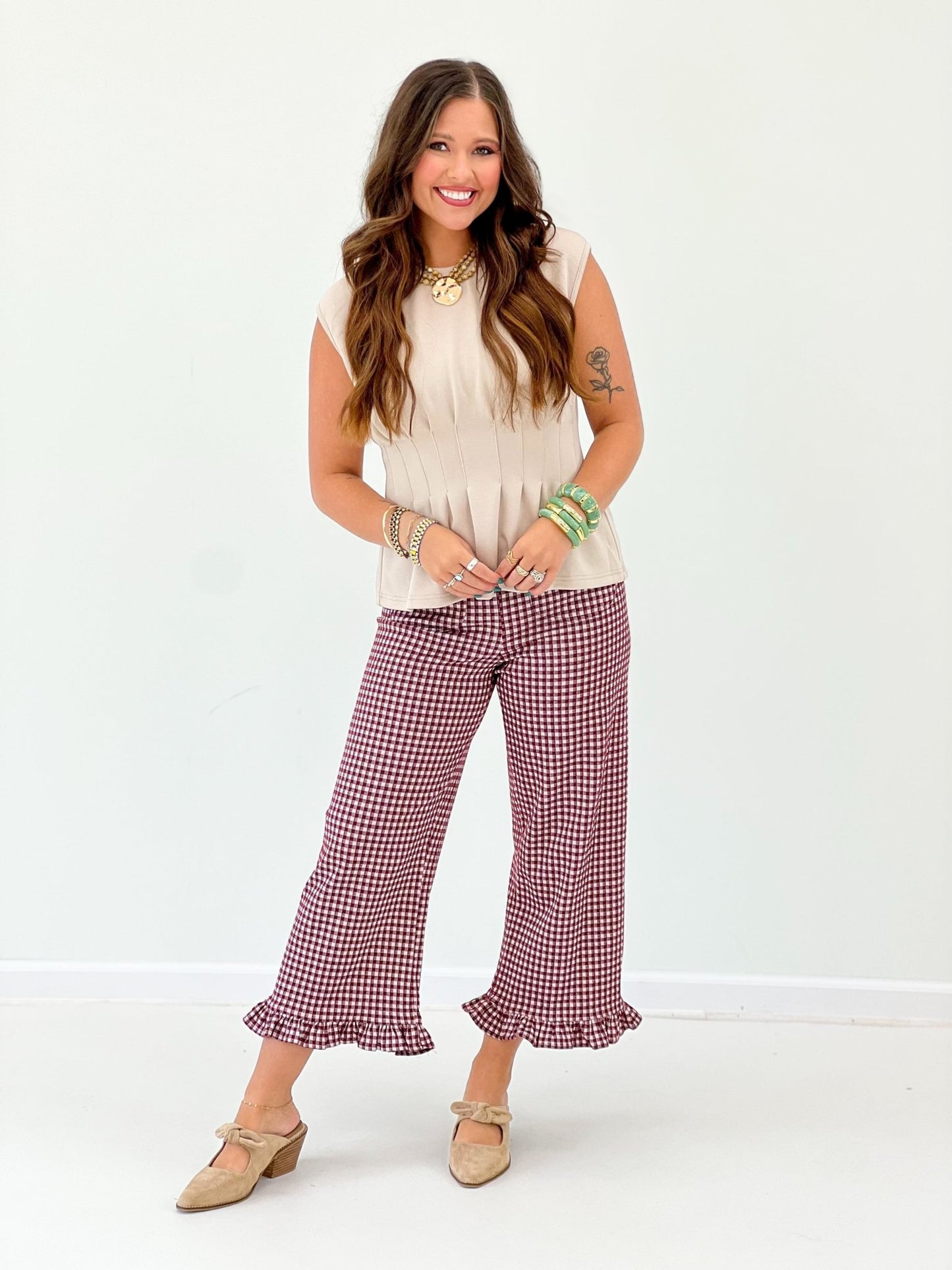 Gingham pants with a relaxed leg and ruffle trim
