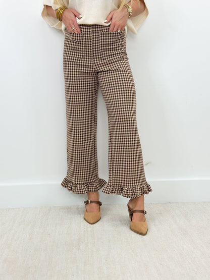 Brown gingham check pants with a ruffled hem