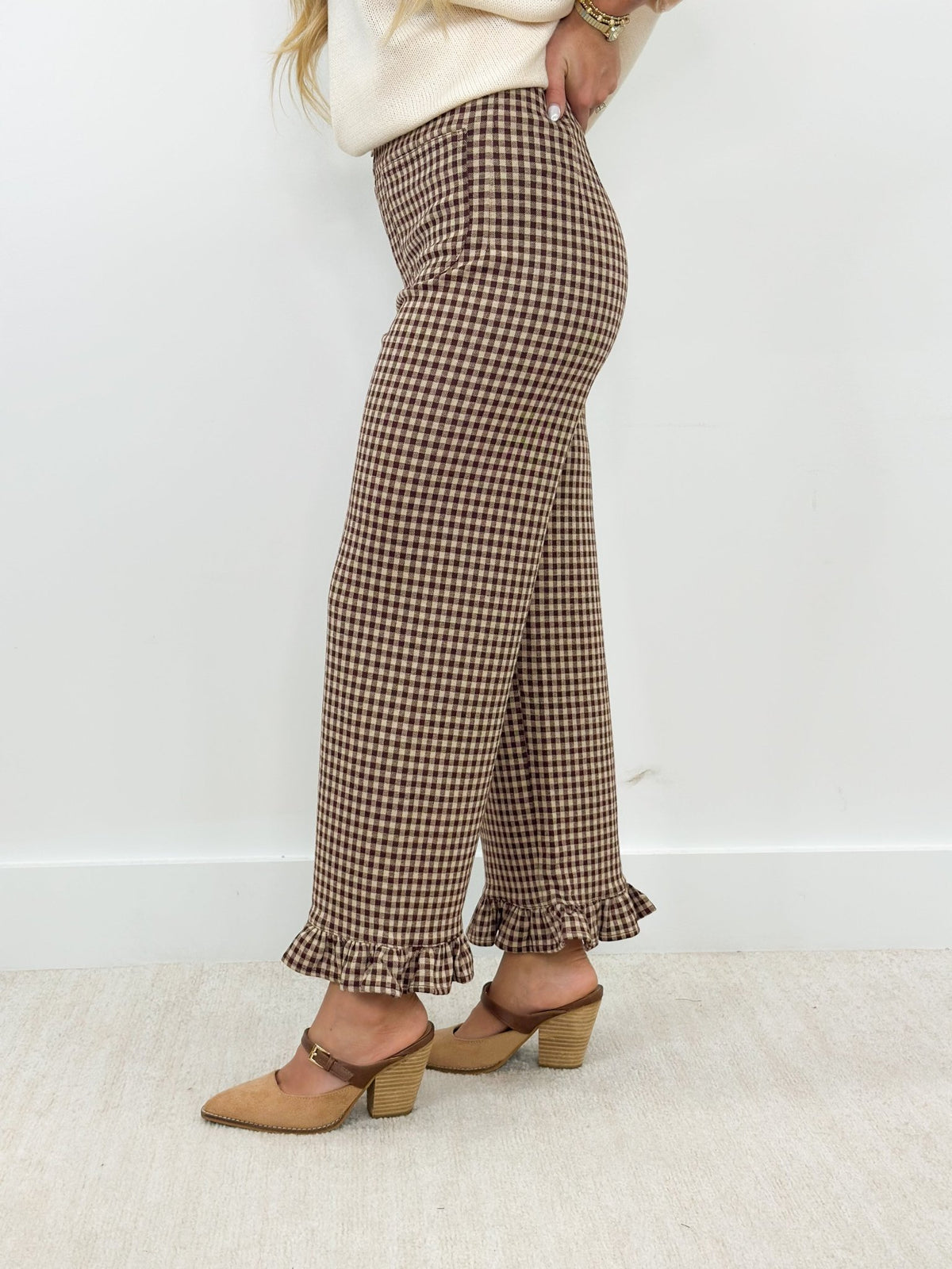 Brown and cream gingham pants finished with a ruffle at the ankle