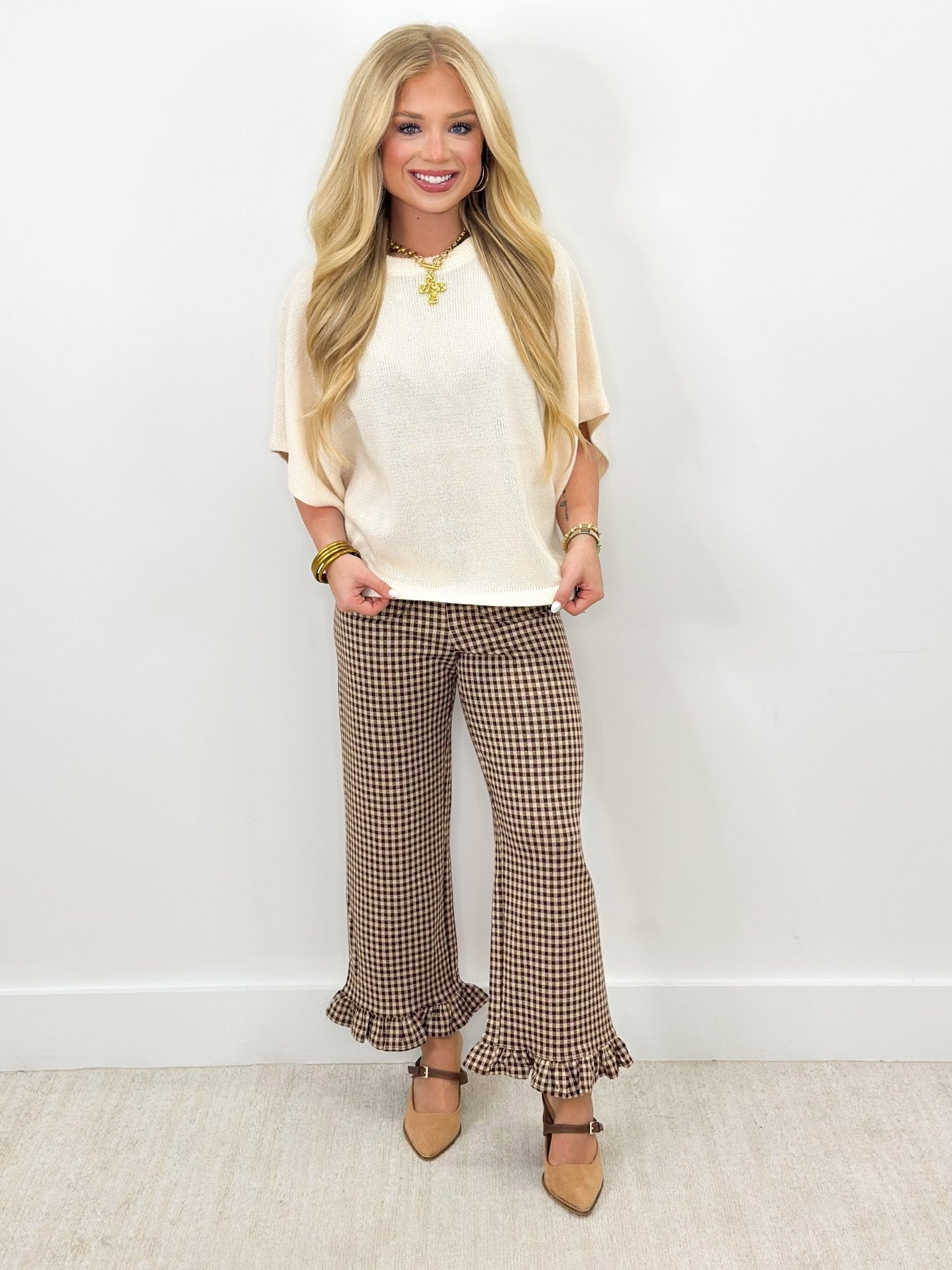 Gingham check pants in brown with a soft ruffled hem