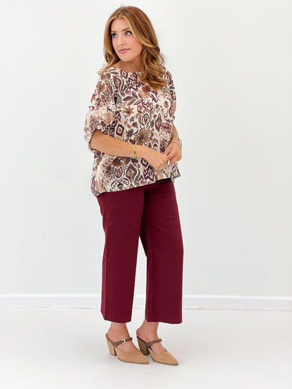 Short dolman sleeve top with a relaxed drape