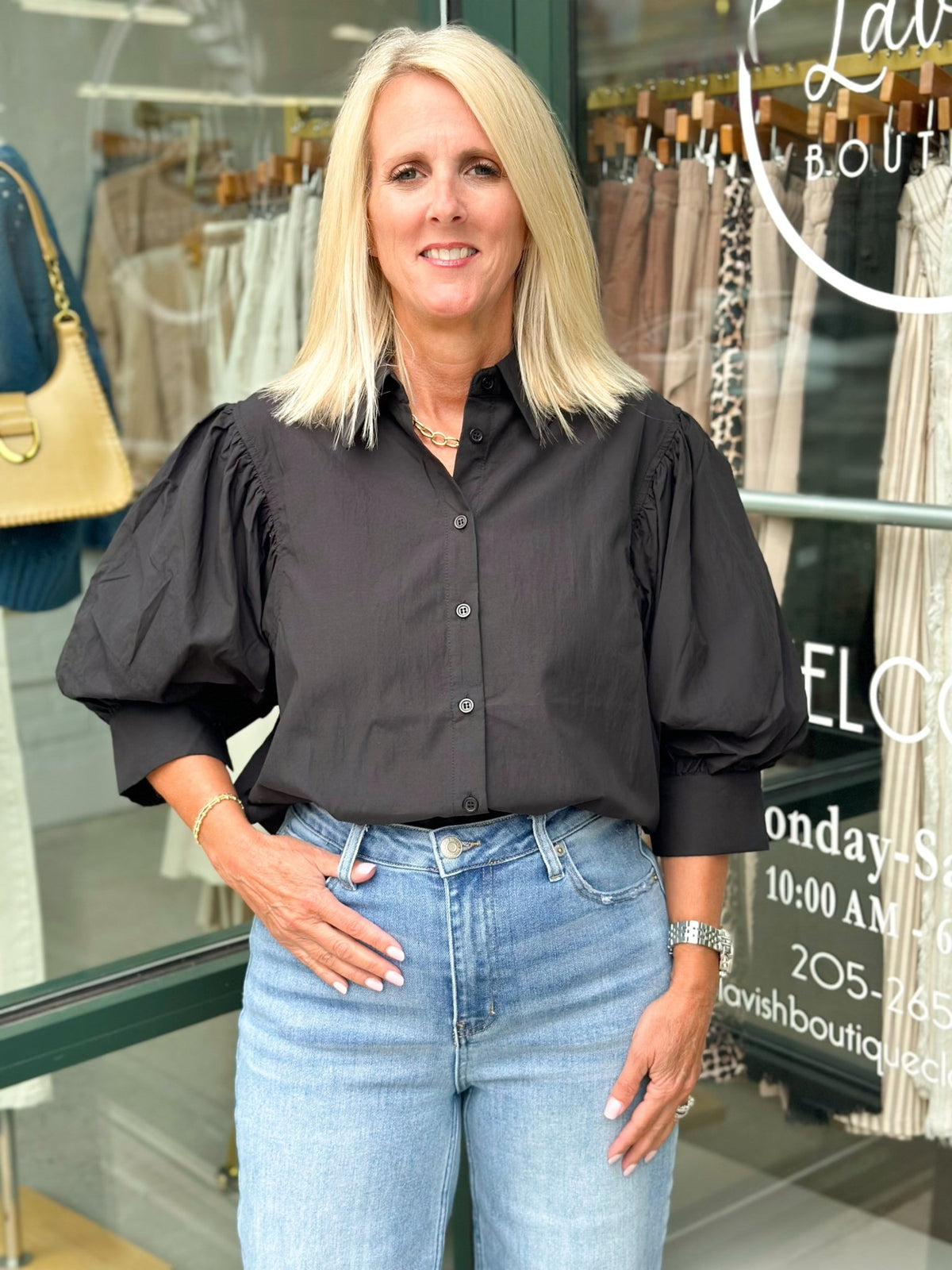 Puff sleeve black blouse with a full button front