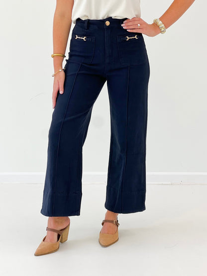 Tailored wide leg pants with bit hardware at the waistband