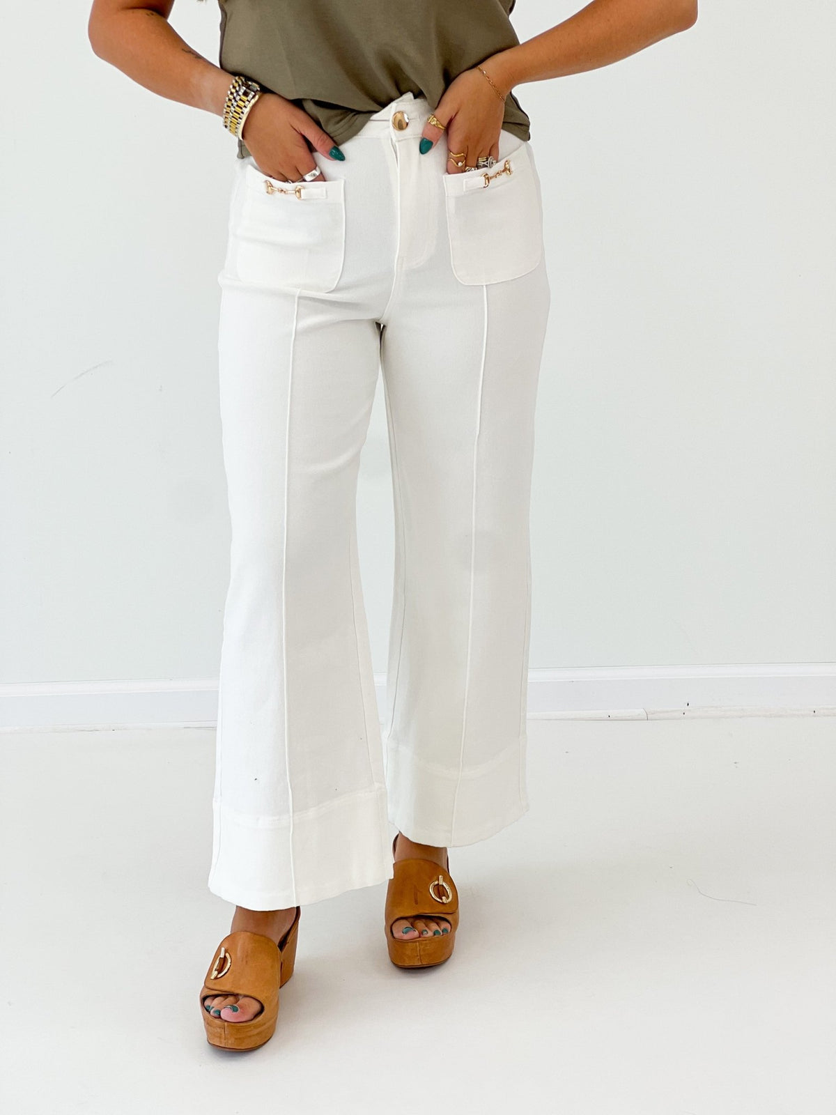 Flowing wide leg pants with a metal bit detail