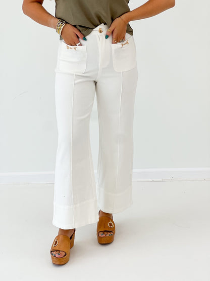 Flowing wide leg pants with a metal bit detail