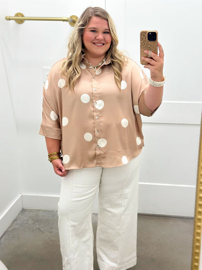 Dotted blouse with a full button front