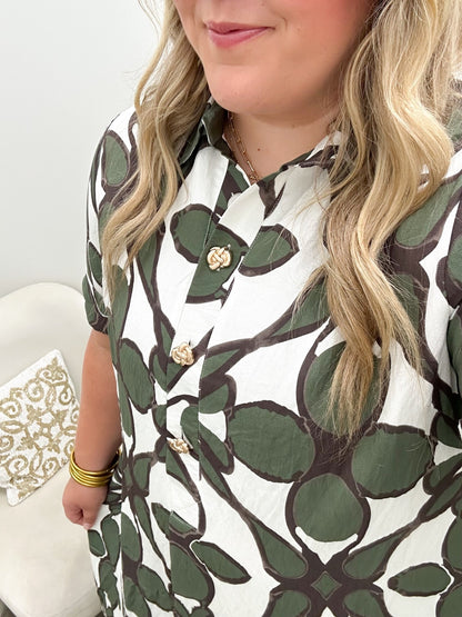 Short sleeve collared midi dress with an allover print