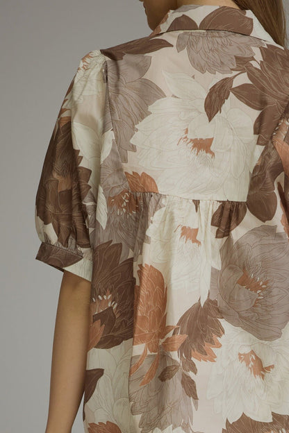 Mocha printed top with a stretchy smocked bodice