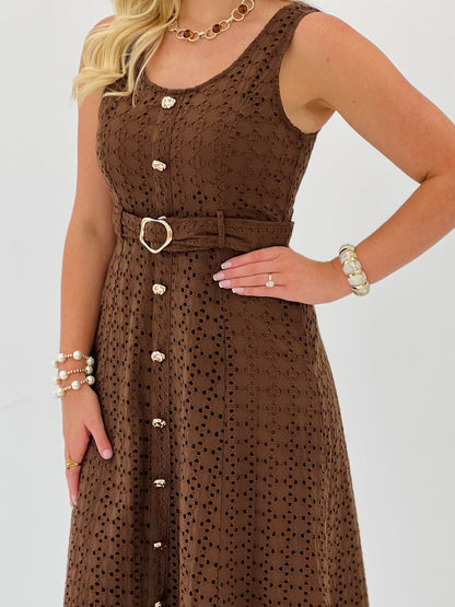 Eyelet fabric detail on a brown belted midi dress
