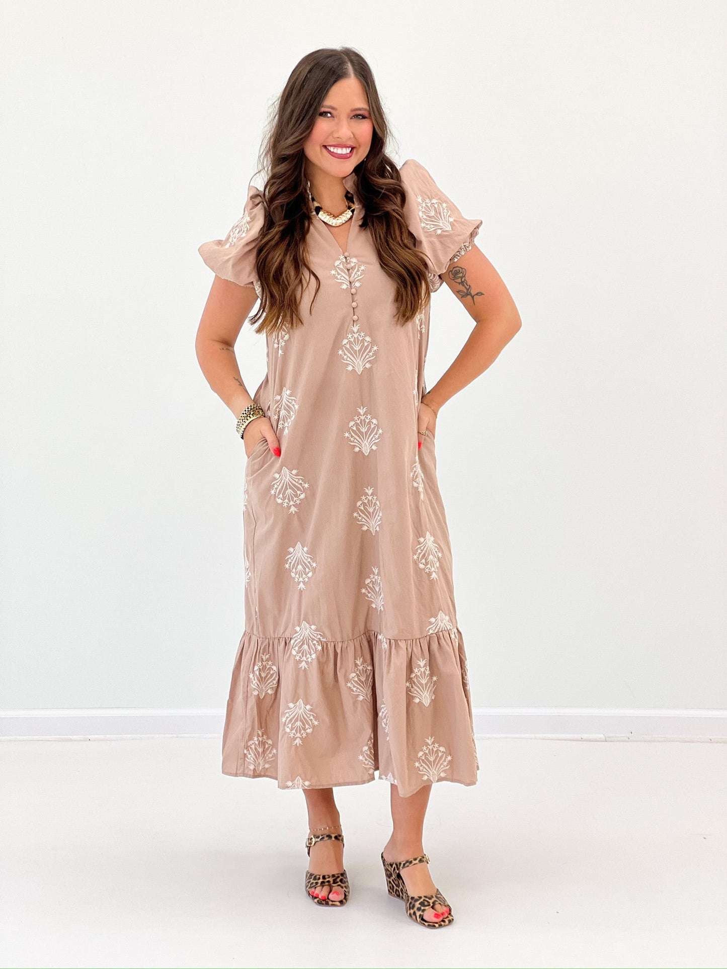 Embroidered puff sleeve dress with a round neckline