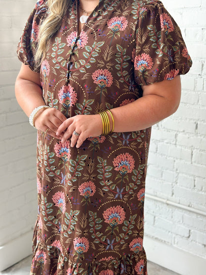 Brown midi dress with eyelet texture and a soft floral print