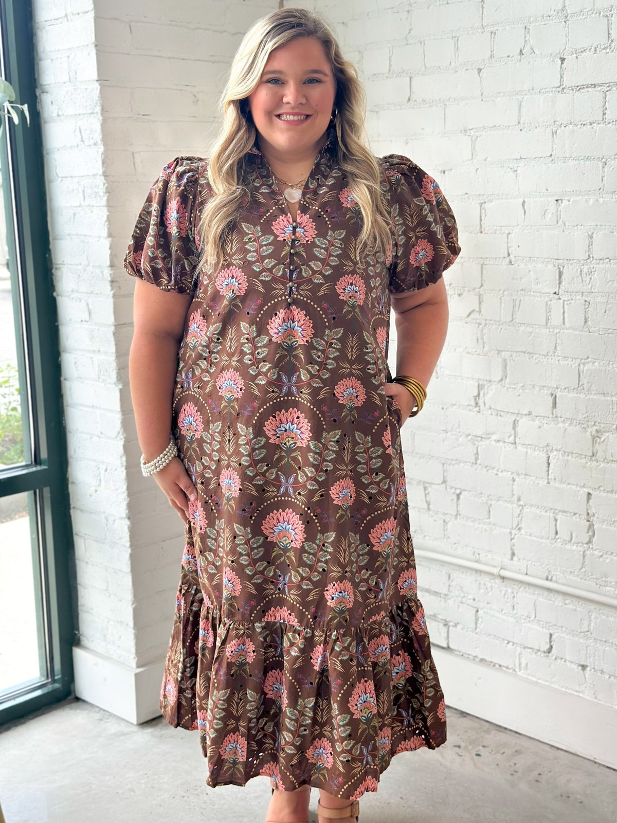 Flowing brown eyelet midi dress in an allover floral print