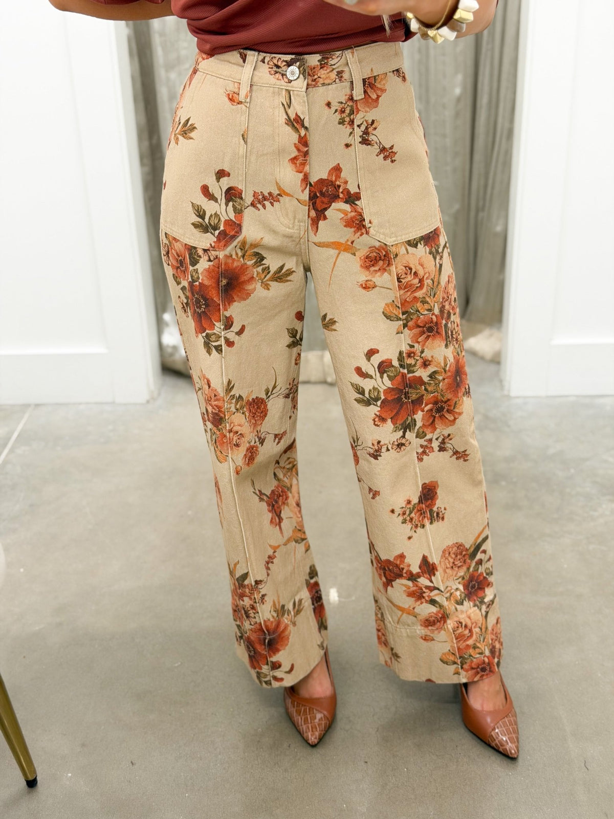 Taupe floral pants with a relaxed high waist