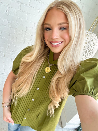 Puff sleeve top with a soft pleated bodice