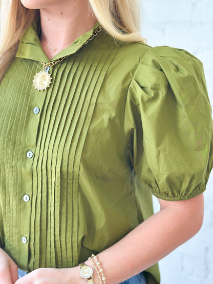 Pleated front top with a round neckline