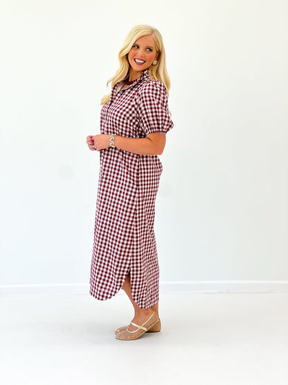 Button placket on a wine gingham dress