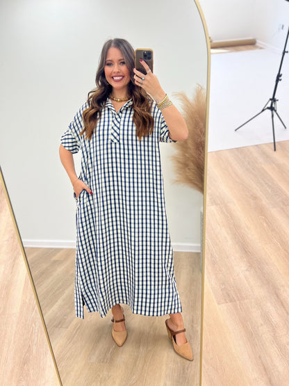 Gingham checked dress falling to a midi length