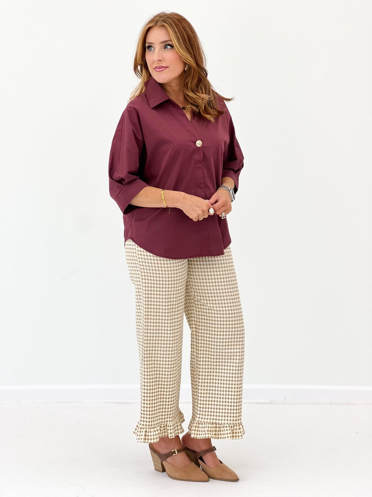Gingham pants with a relaxed leg and ruffle trim