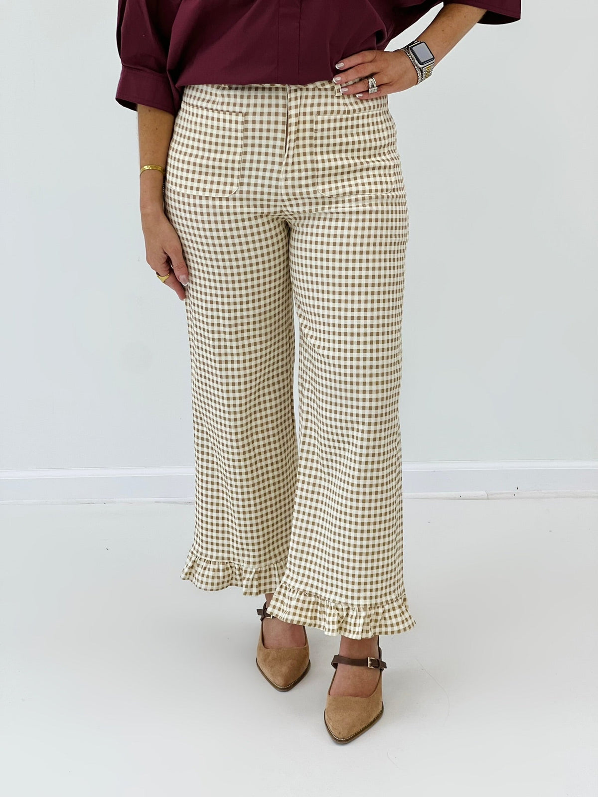 Gingham check pants with a ruffled hem