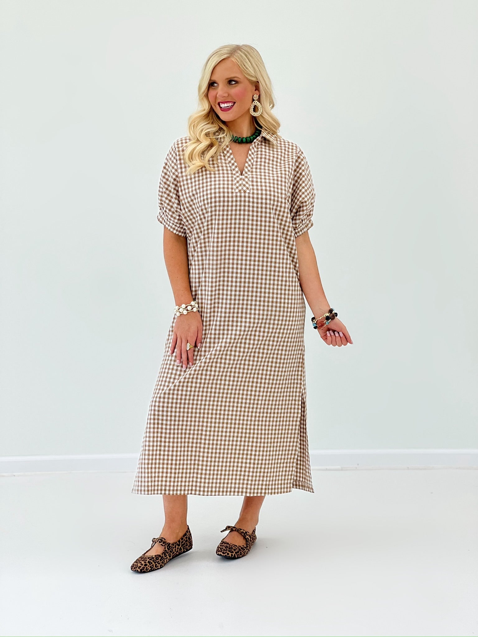 V-neck collar detail on a camel gingham dress