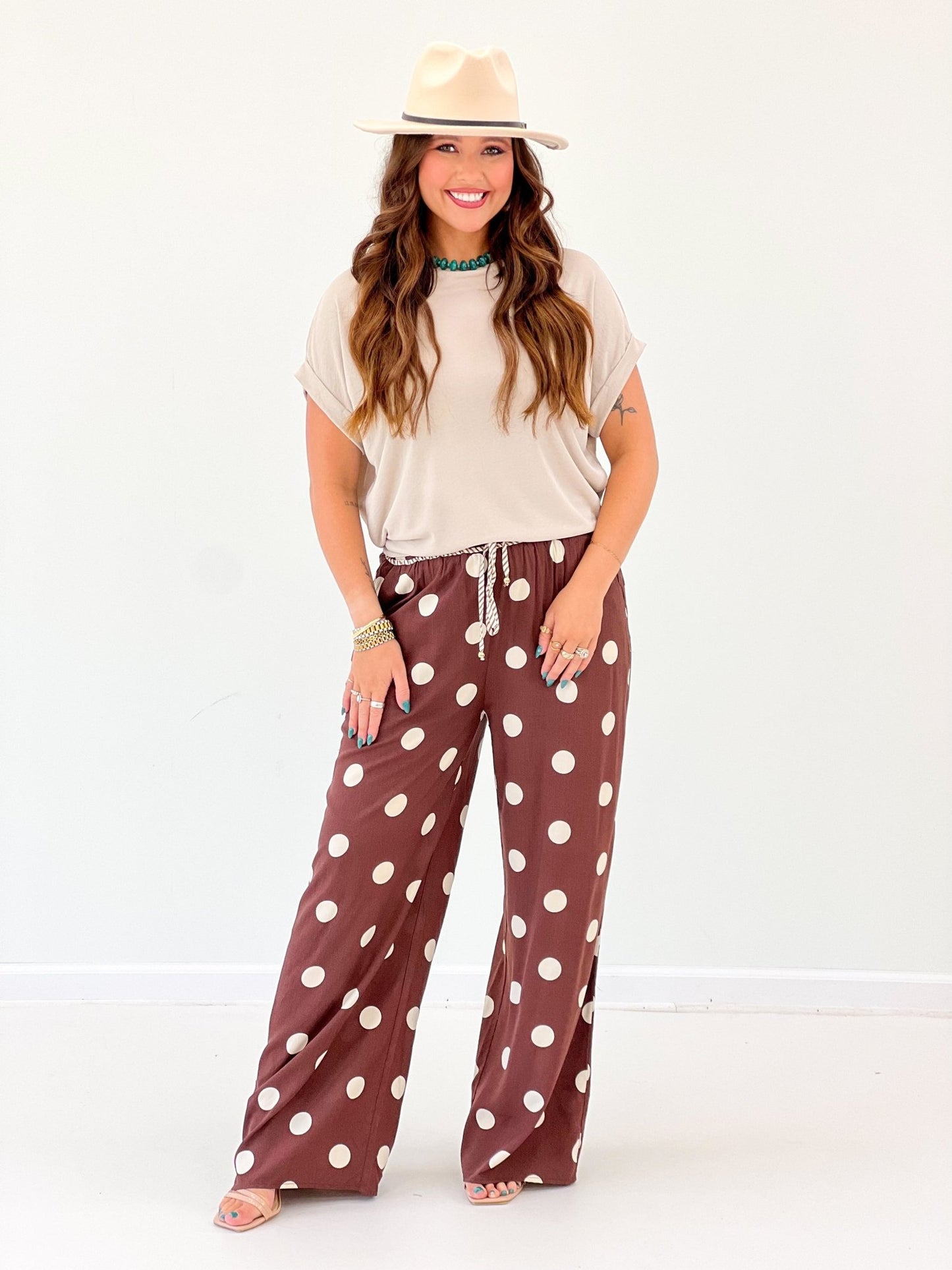 Brown polka dot wide leg pants with a soft drape