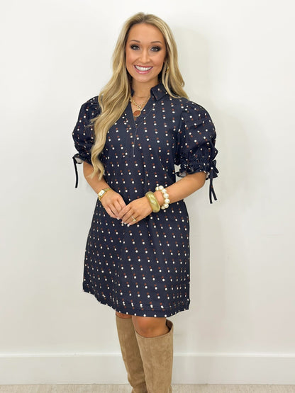 Dotted print dress with cuffed short sleeves