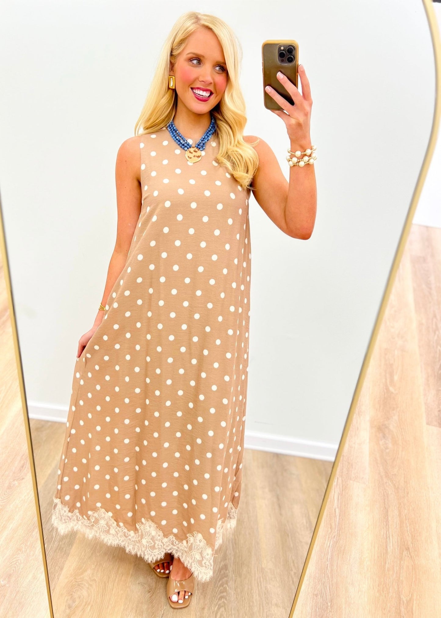 Latte polka dot sleeveless midi dress with a lace-trimmed hem