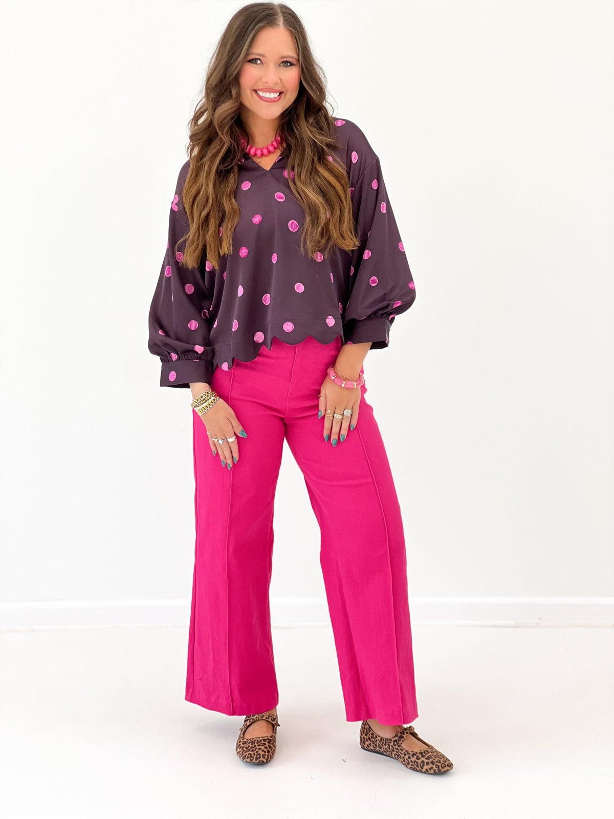 Plum dot print blouse with a soft drape