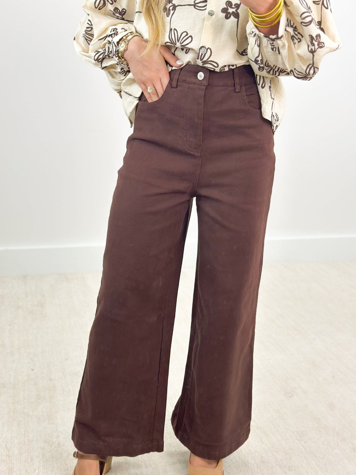 Wide leg stretch denim with a button and zip front