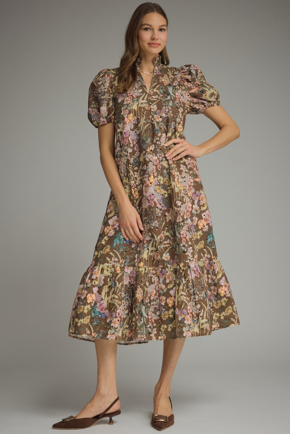 Brown floral eyelet midi dress with a ruffled collar and gold buttons