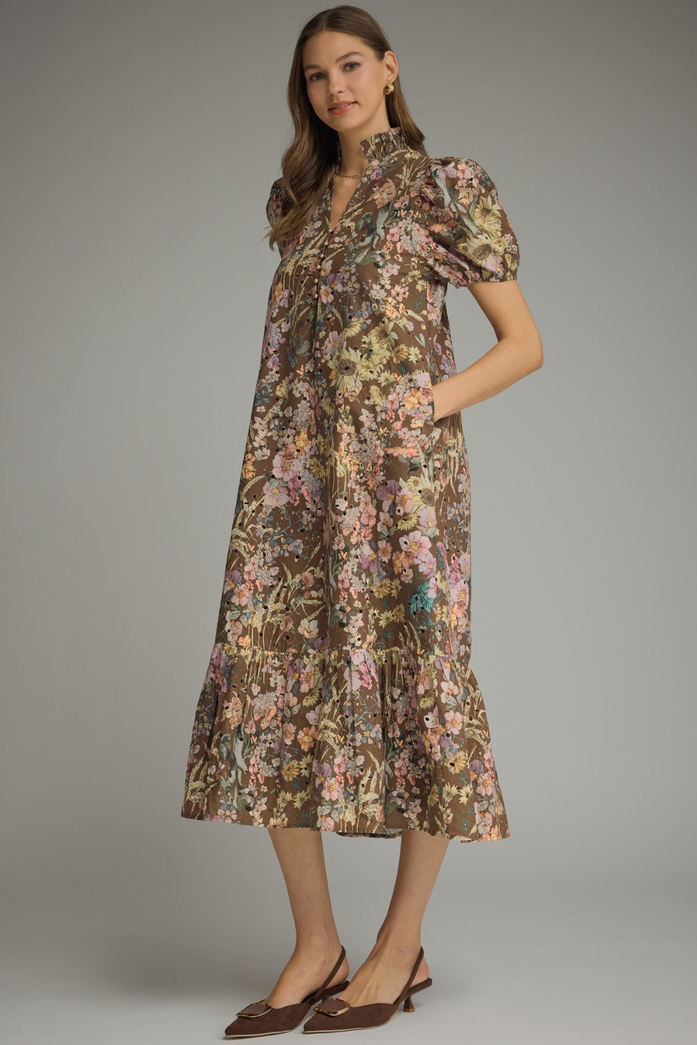 Brown floral midi dress with short puff sleeves and a button front