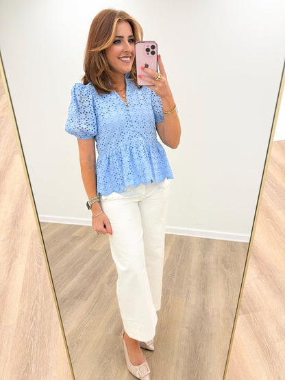 Ruffle neck blouse with eyelet embroidery