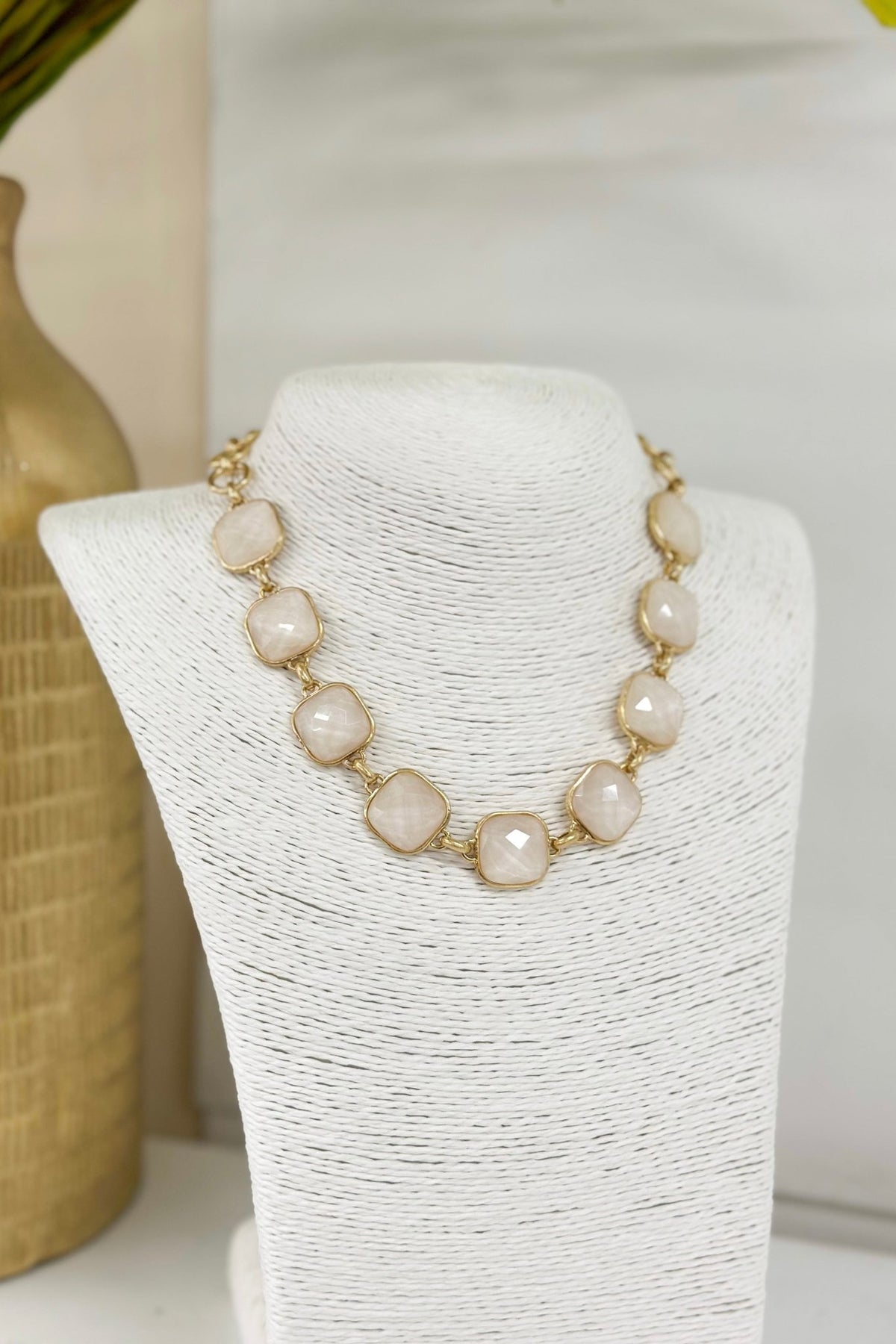 Two-piece necklace set with linked faceted stones