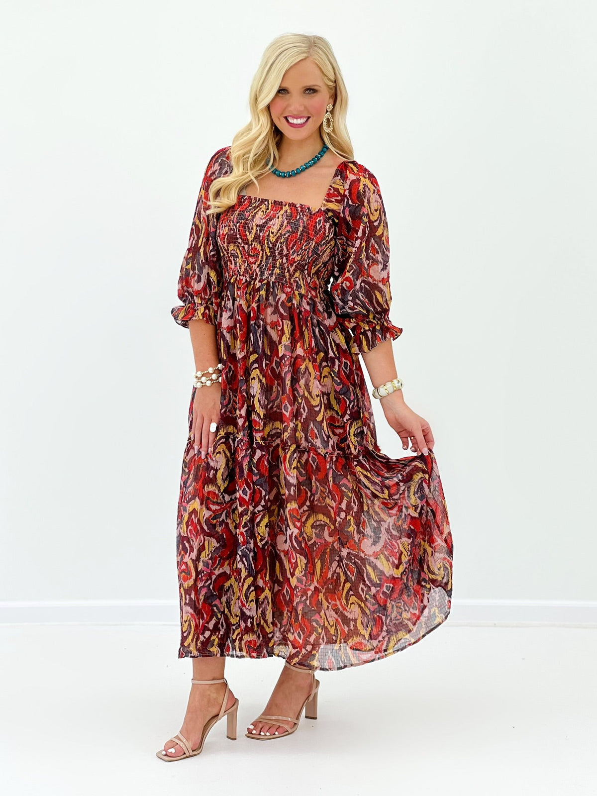 Smocked chiffon dress in red and mustard