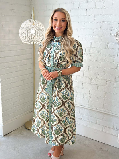 Floral button up dress with a knotted waist tie