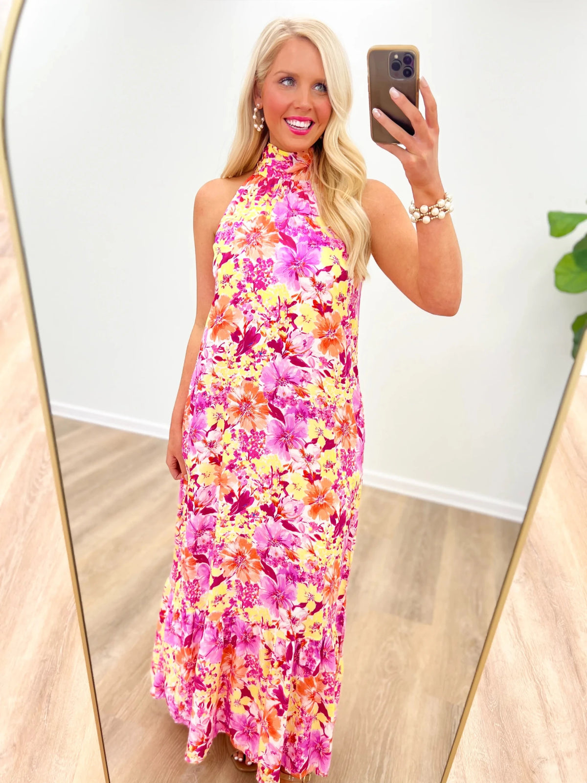 Red floral maxi dress with a long, flowing skirt