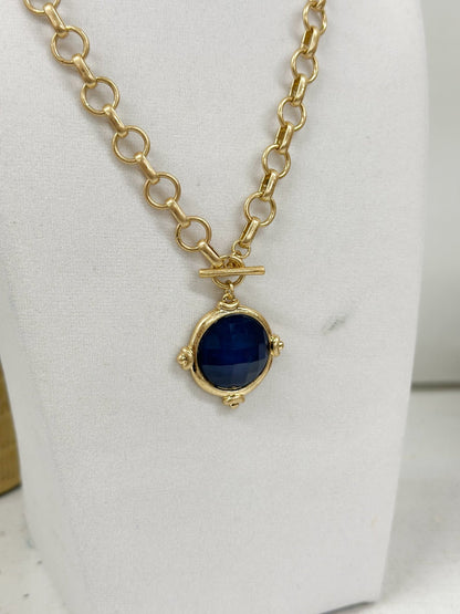 Metal-framed faceted stones strung into a necklace