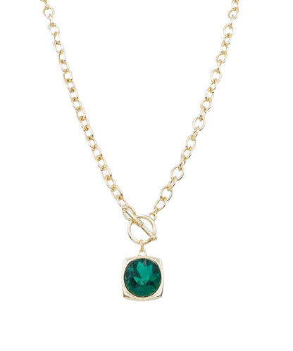 Single framed stone pendant suspended from a delicate chain