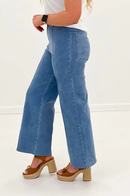 Wide leg pants with a sharp front seam and straight hem