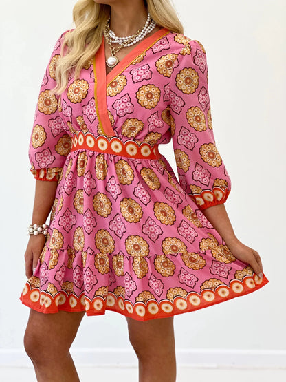 Short printed mini dress with softly gathered sleeves