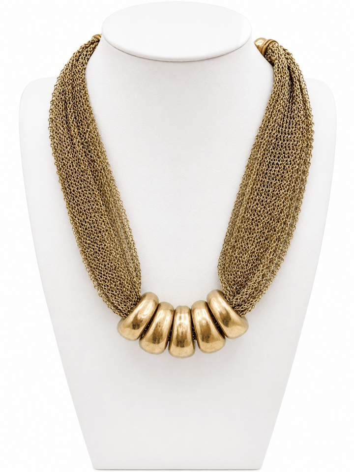 Gold mesh necklace with a geometric ring accent