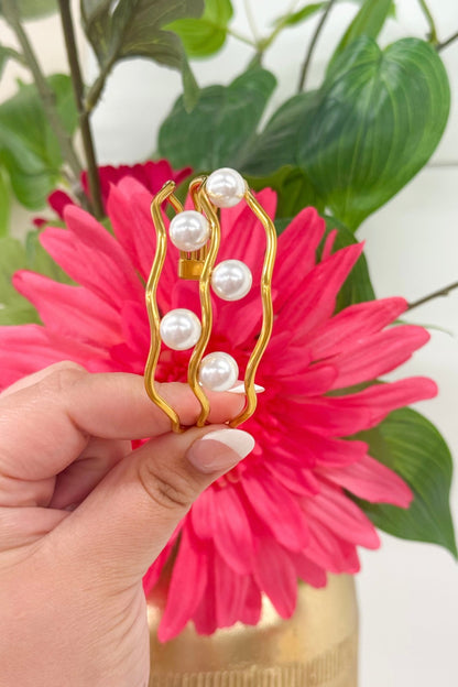 Gold pearl bangle with a smooth band