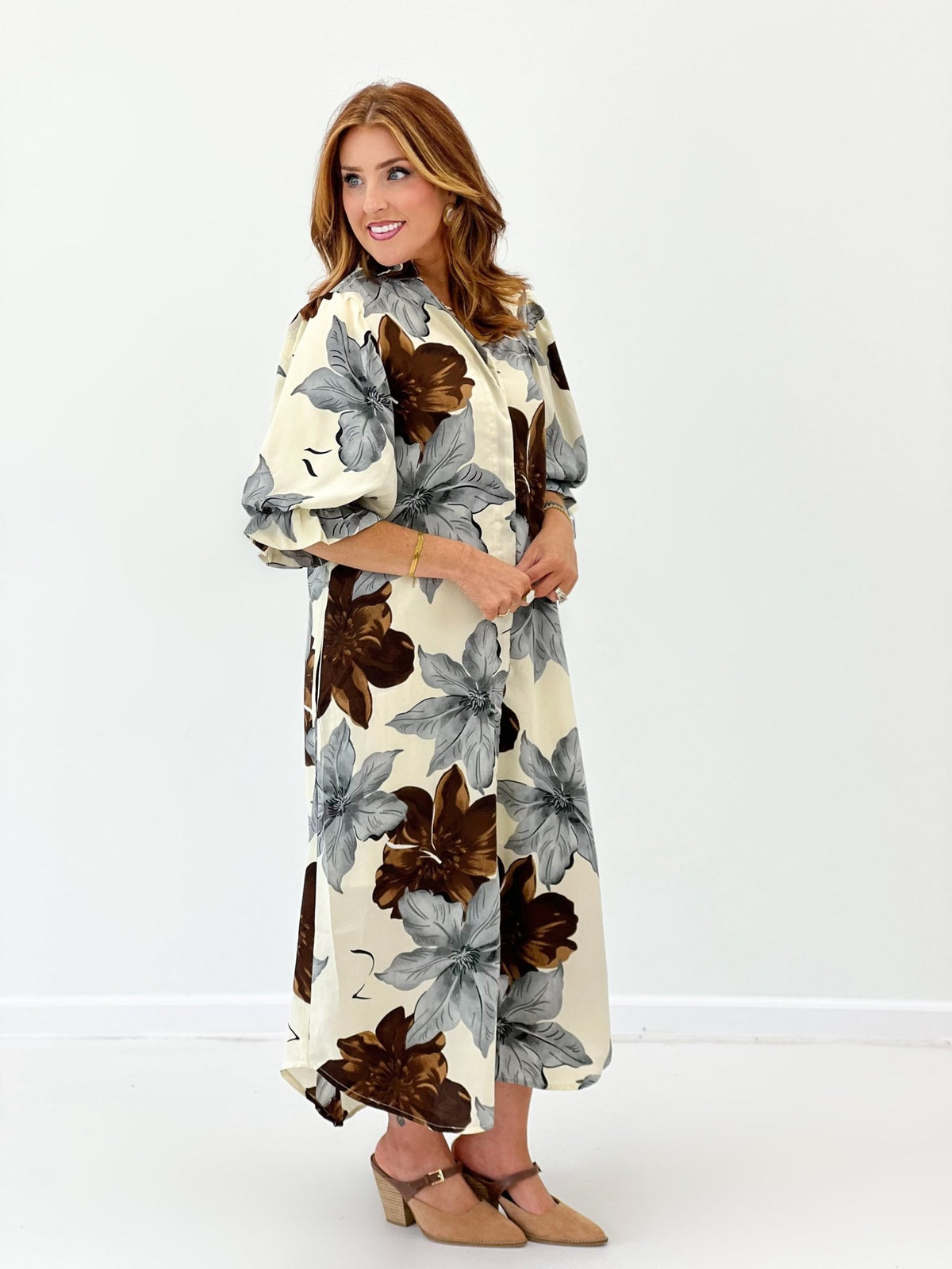 Cream floral print maxi dress with a long flowing skirt