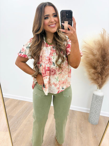 Puff sleeve floral blouse with a deep v-neck