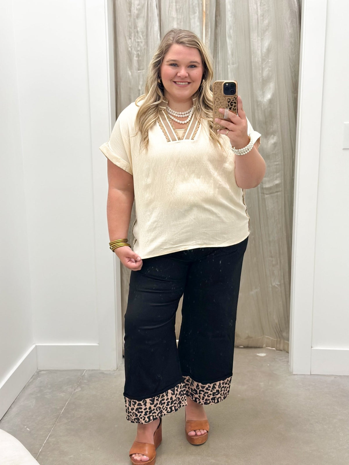 Natural toned top with striped panels and lace edging