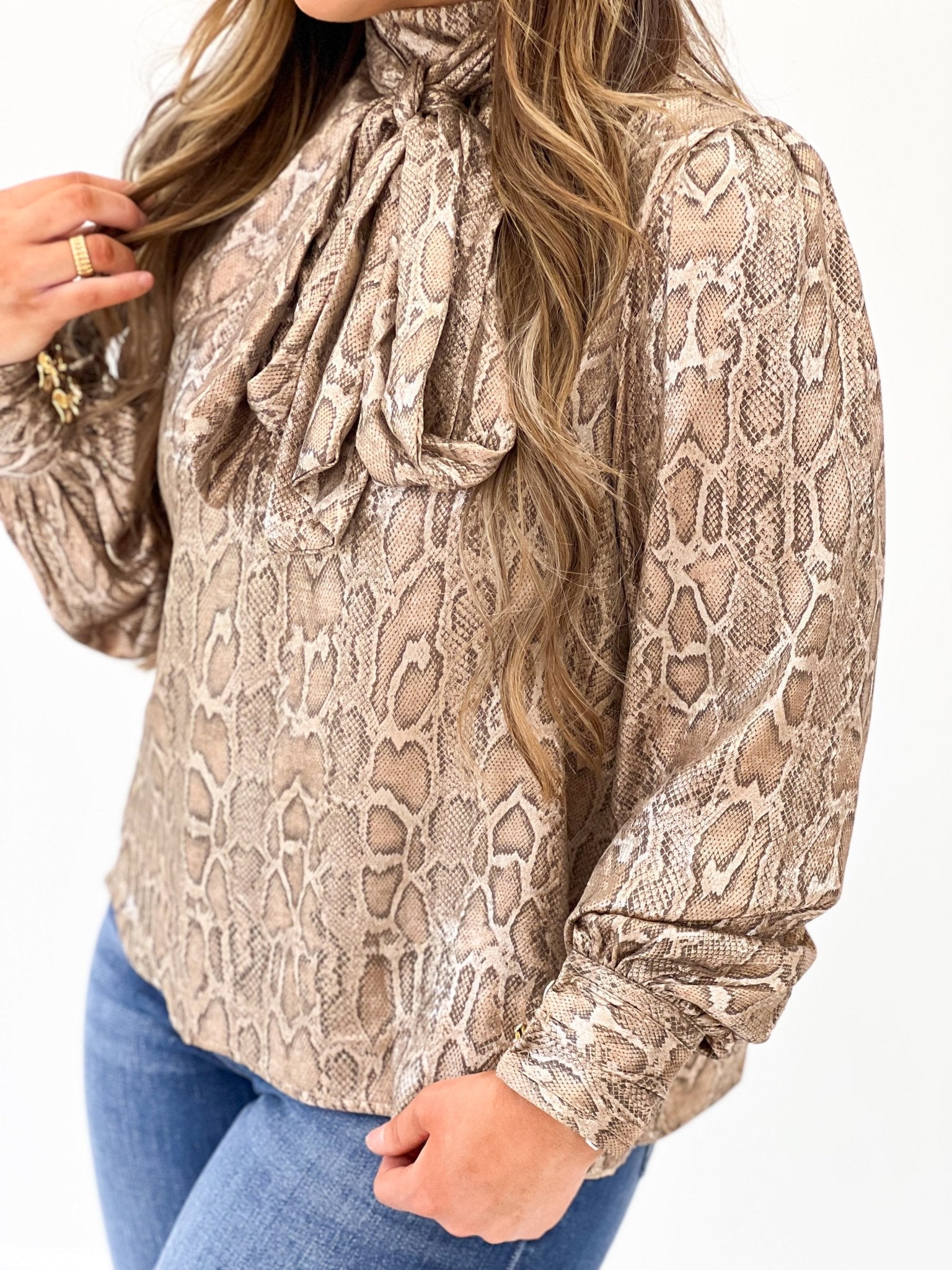 Animal print satin top in a warm taupe