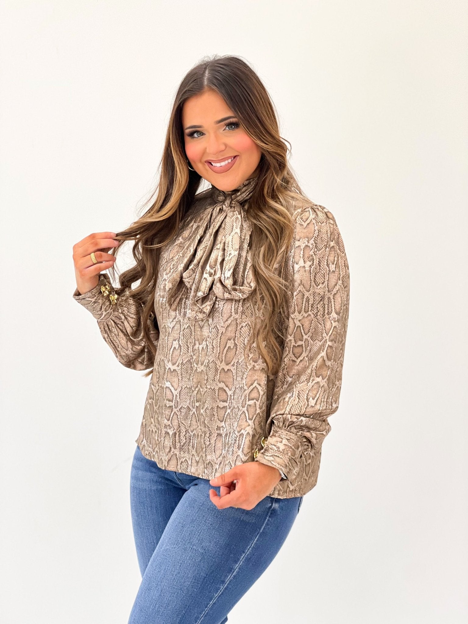Satin high neck top in a taupe animal print