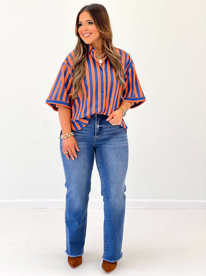 Navy and white stripe top with a full button placket
